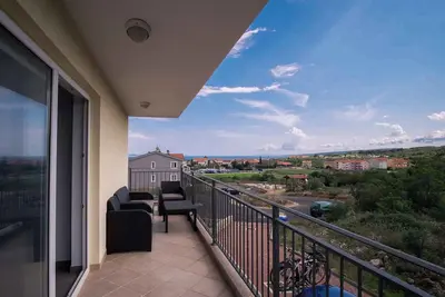 Image de Appartement de vacances avec air conditionné et mobilier neuf