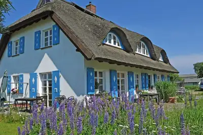 Appartement sous un toit de chaume Haus Sonnenwinkel