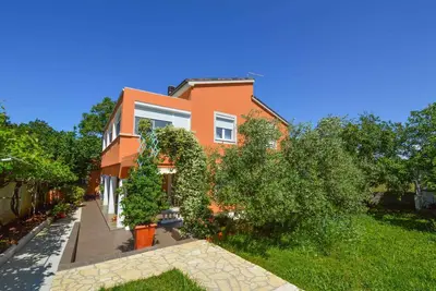 Image de Appartement de vacances avec terrasse et air conditionné