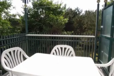 Image de Appartement de vacances avec climatisation, balcon et piscine