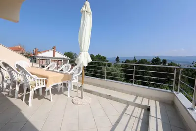 Image de Appartement de vacances avec climatisation et vue sur la mer