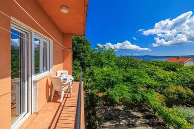Image de Appartement de vacances avec climatisation, Internet et balcon avec vue sur la mer