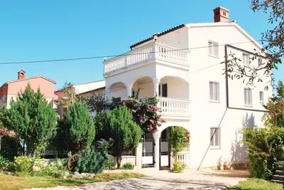 Image de Maison de vacances avec climatisation et terrasse