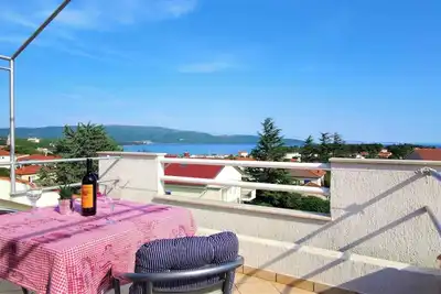 Image de Appartement de vacances avec vue sur la mer, terrasse, Wi-Fi et climatisation