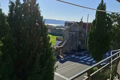Image de Appartement de vacances avec balcon et vue sur la mer
