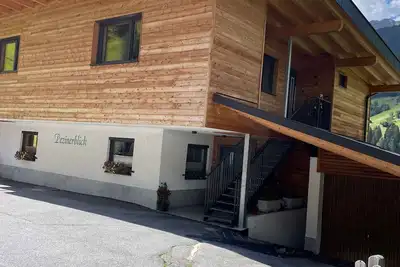 Image de Appartement de vacances avec un panorama sur les montagnes et les montagnes environnantes