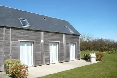Image de Maison familiale près des dunes avec terrasse, jardin et équipements bébé – Animaux acceptés