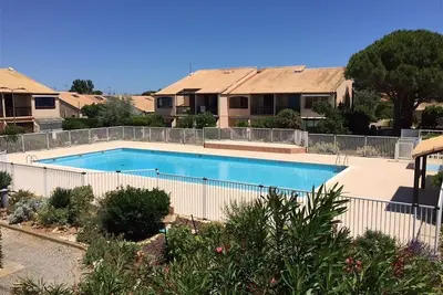 Image de Charmante Villa T2 Mezzanine avec Piscine, Terrasse et Parking - Plage à Proximité