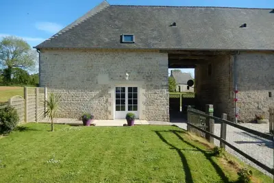 Image de Gîte Charmant Proche Plages du Débarquement avec Jardin Privé et Confort Moderne