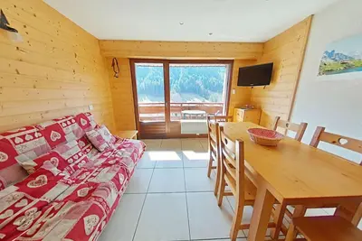 Image de Appt cosy 3 pièces avec mezzanine - 6 couchages, parking, animaux admis - Grand Bornand