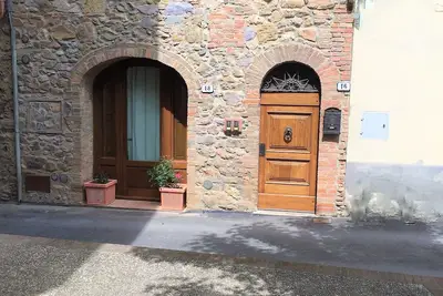 Résidence toscane typique dans un ancien village à la périphérie de Sienne