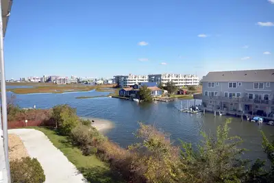 Image de Super luxe Condo 3 chambres avec WiFi dans une communauté fermée sur Bayside avec piscines intérieure / extérieure, plages privées, restaurant, et plus encore à seulement dix minutes de la plage!