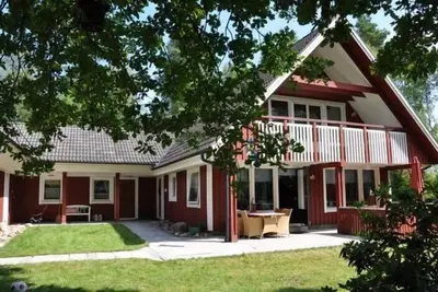 Image de Maison de rêve au bord du lac à Småland - sauna, cheminée, bateau \/ moteur, WiFi, jardin avec clôture,