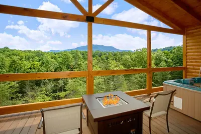 Image de Cabine Romantique, Amazing View, un foyer et un salon extérieur. Wifi gratuit