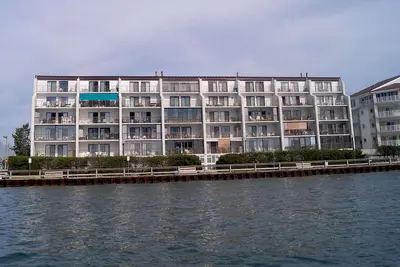 Image de Crab Cove On The Bay 406-Baywater 3rd St, WiFi gratuit, piscine, Elev, W / D, Ac