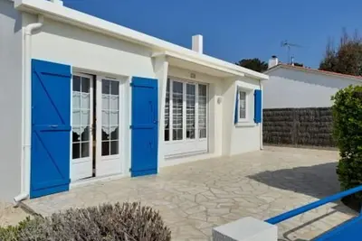 Image de Charmante villa 3 chambres, jardin clos, à 700m de la plage - rue calme et bien située