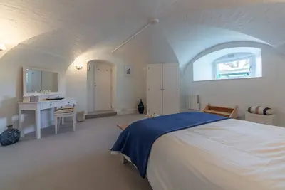 Image de Sur le site du phare de Cromer avec des vues spectaculaires sur la mer, est un chalet d'une chambre intéressante.