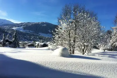 Appartement triplex dans chalet, vue spectaculaire de Megève et massifs alpins