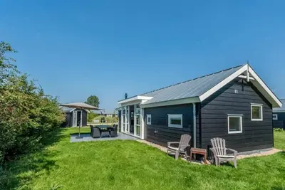 Image de Profitez de la vue dégagée dans ce chalet moderne en bordure du parc. Profitez d’un chalet avec un i