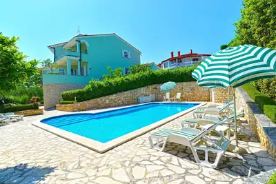 Image de Appartement de vacances avec piscine commune et climatisation