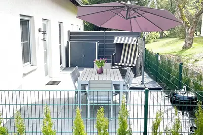 Image de Maison de vacances idéalement située pour les familles avec chiens, WiFi, à 200m du lac Plauer