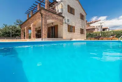 Image de Villa Orlene avec piscine, 4 unités de climatisation, volley et tennis