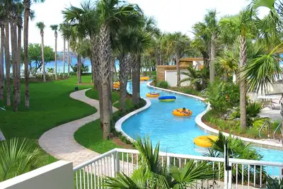 Image de Super tarif d'août! Lovely Condo! Accès facile Lazy River, Piscines, Service Bch, WiFi