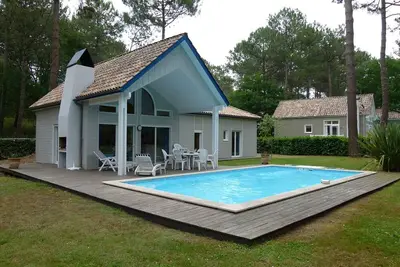 Image de Villa T3 avec Piscine Chauffée, Golf et Plage à Proximité - Linge et Ménage Inclus