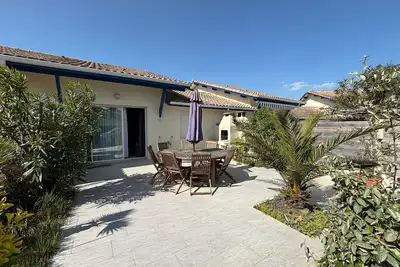 Image de Maison en Duplex au Pied des Dunes à Biscarrosse - Calme et Confort, Parking et Terrasse