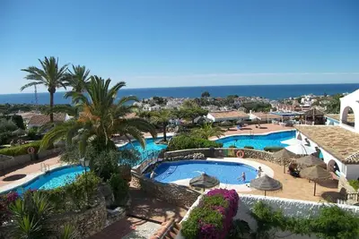 Image de El Capistrano, Nerja Appartement de 2 chambres avec jardin privé plein sud