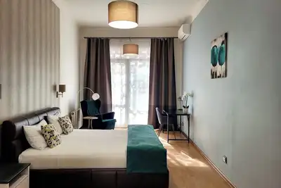 Image de 4 Rooms • King Beds • Centre •Ac •Balcony •Netflix