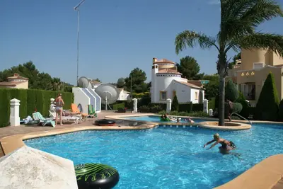 Image de Villa individuelle avec jardin et piscine commune