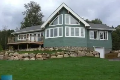 Image de A Lakeshore Cottage Construit 2008 avec plage privée