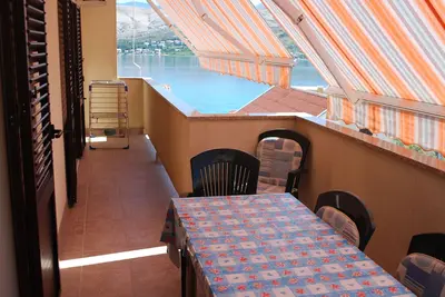 Image de Appartement de deux chambres avec la terrasse et la vue sur le mer Pag (A-11487-b)