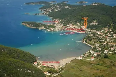 Image de Appartement de quatre chambres avec la terrasse et la vue sur le mer Kampor, Rab (A-12273-b)
