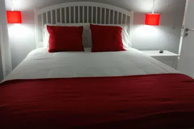 Image de maison sur la plage avec 1 chambre à coucher
