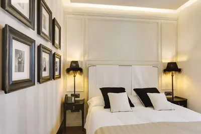 Image de Chambre Deluxe au Colisée avec salle de bain privée