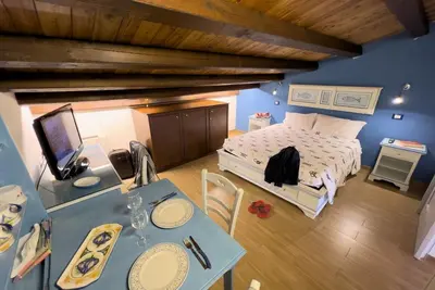 Image de Cerri. Appartement mansardé dans des appartements Domus Mariae pour une utilisation touristique.