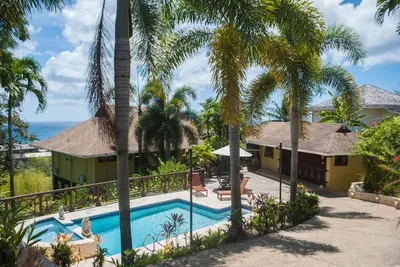 Luciana: Light & Airy Home with Windows for Walls & Caribbean Open Plan Living