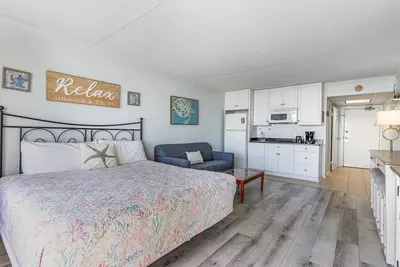 Image de Magnifique côte est des levers de soleil de ce condo en bord de mer de dunes de sable pour 4 personnes