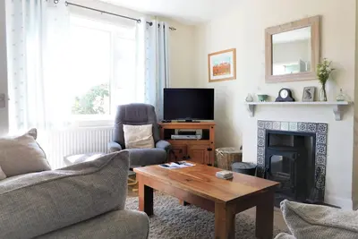 Image de Poppy Cott - chalet traditionnel avec une vue imprenable sur Beeston Common, la retraite parfaite.