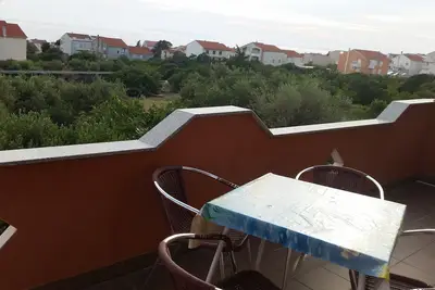 Image de Appartement de deux chambres avec la terrasse et la vue sur le mer Novalja, Pag (A-13200-a)