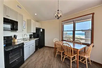 Image de Beach Break Cottage - Excellente vue sur l'océan - À quelques pas de la plage - Piscine communautaire