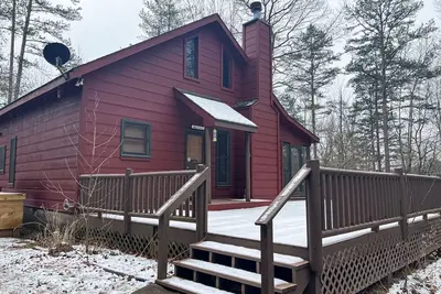Cabine parfaite avec bain à remous privé, espace de pont, cheminée et plus