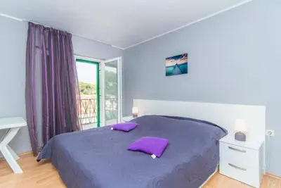 Image de Appartement de deux chambres avec la terrasse et la vue sur le mer Povlja, Brac (A-12362-a)
