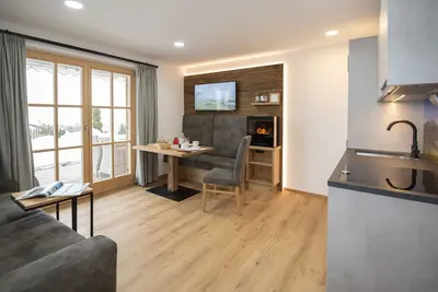 Image de Zwei-Raum-Wohnung Kaiserwinkl - Walmbergstr. 23, Dusche\/Wc, Extra-Schlafraum, Küchenzeile, Terrasse