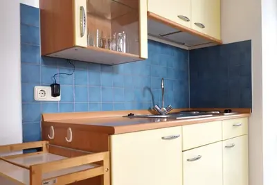 Image de gemütliche Ferienwohnung für 1-4 Personen mit großem Balkon und Bergblick (Wohnung 2)