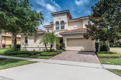 Image de Golf Home - Accès au parc aquatique - Climatisation - Grill - Télévision par câble - Salle de jeux - Piscine - Vélos