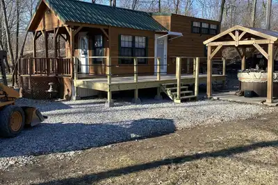 Image de Cabine peut accueillir 4 idéal pour la pêche en famille! A également des vélos et des bateaux.