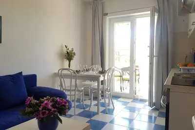 Garçonnière avec la terrasse Banjol, Rab (As-5071-a)